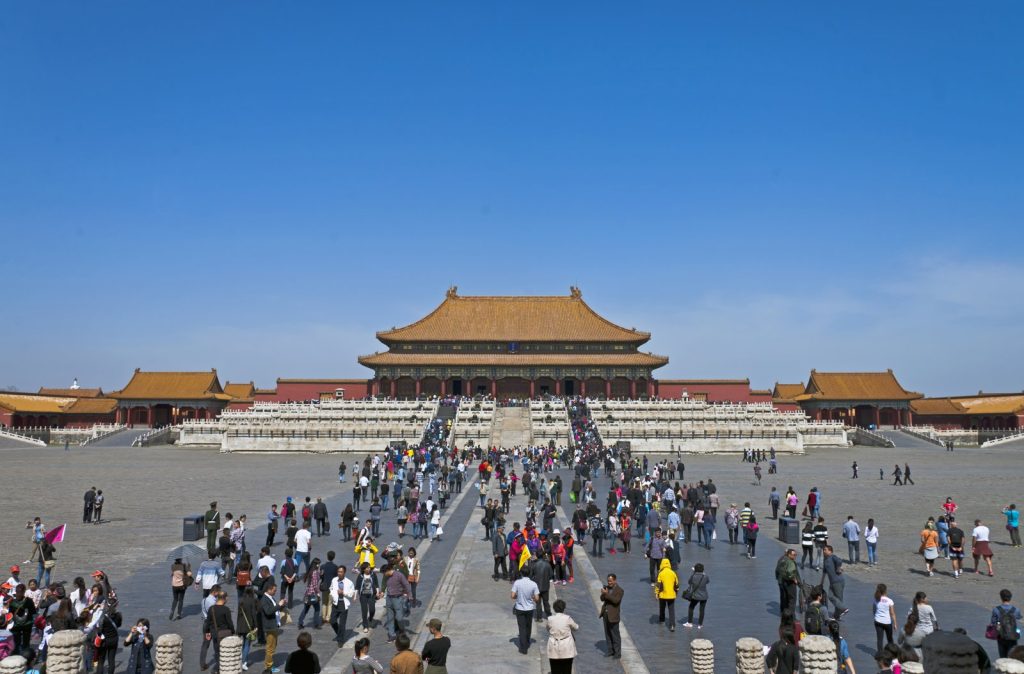Tourists at the Hall of Supreme Harmony in the Forbidden City, Beijing