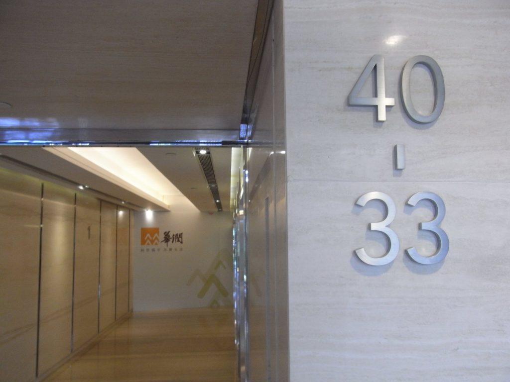 Quiet office building lift lobby on an ordinary workday