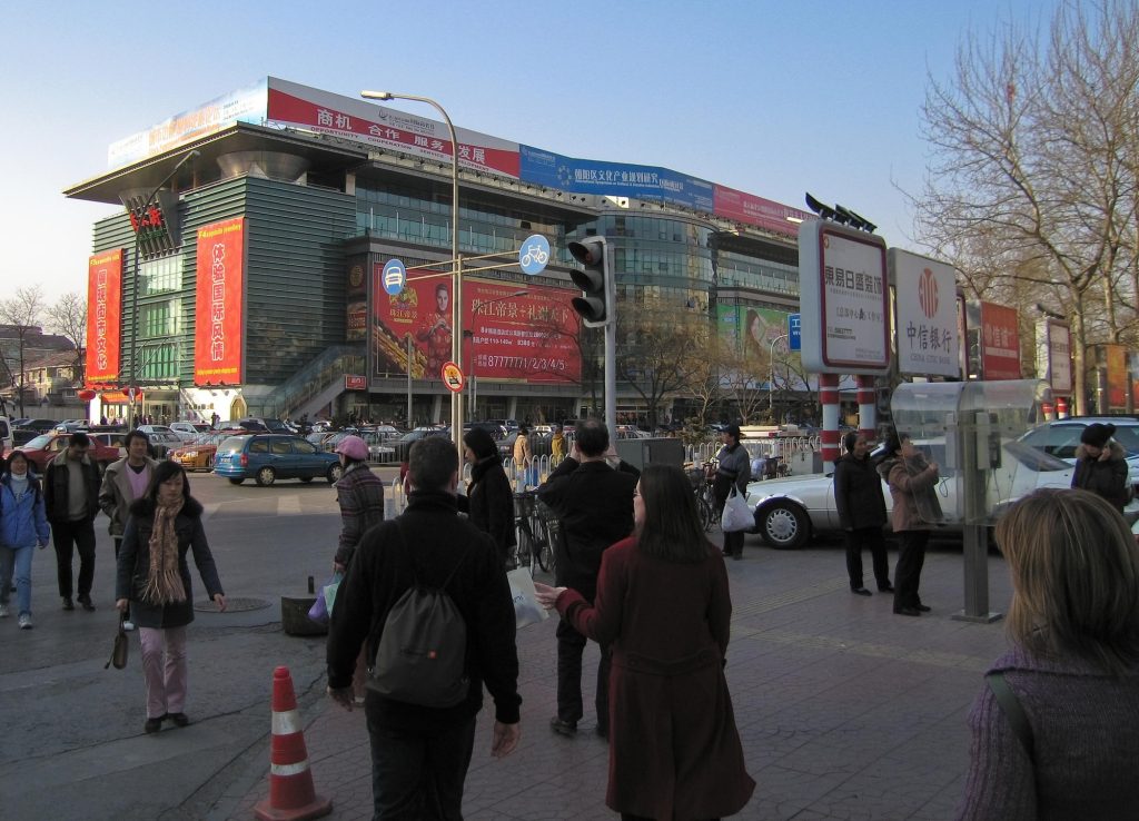 Interior of Beijing Silk Street shopping centre with fabric and gift displays