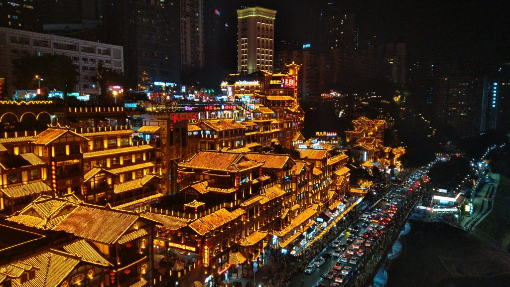 Hongyadong (Hongya Cave) lit at night seen from Qiansimen Bridge in Chongqing