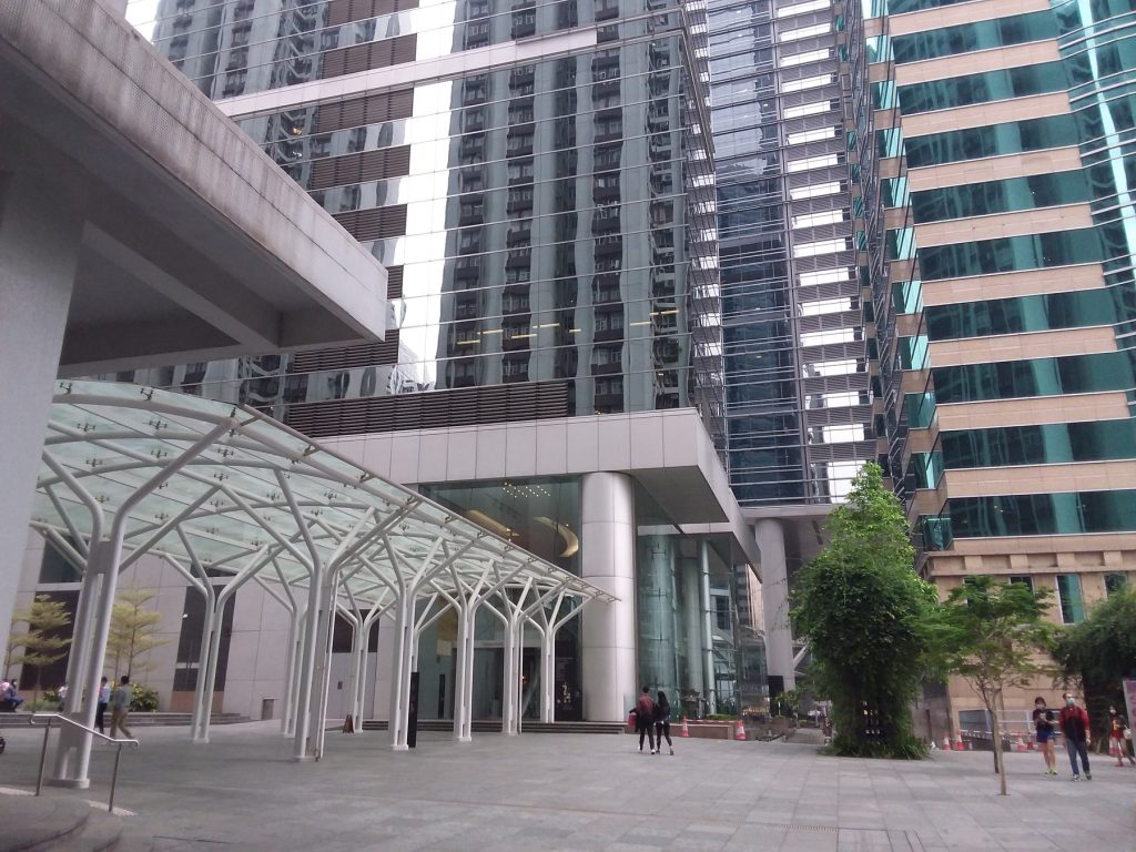 Quiet lobby interior of Oxford House office building in Quarry Bay
