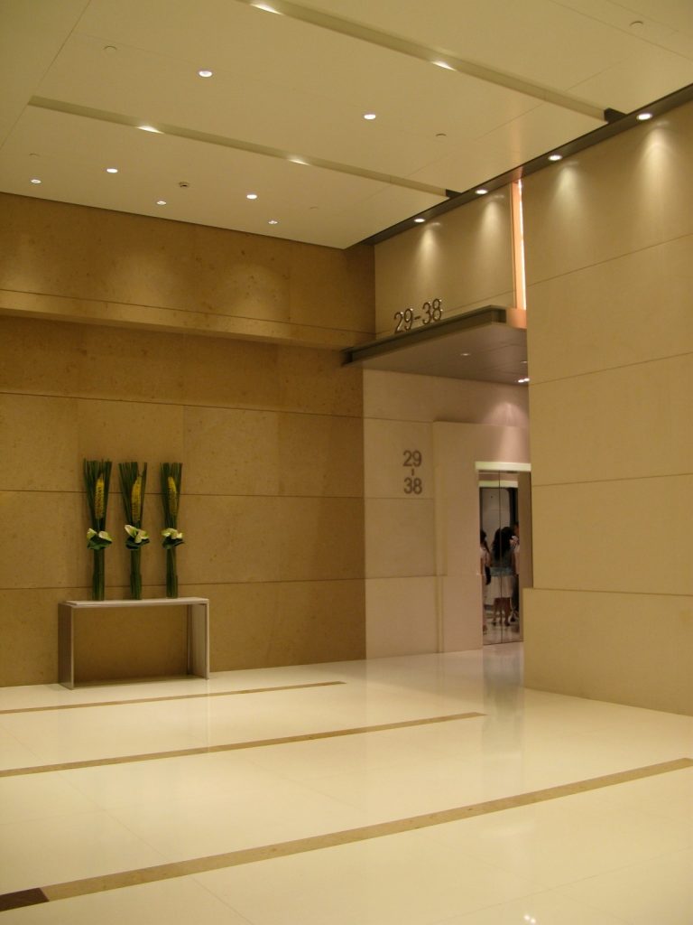 Quiet office lift lobby interior at Shanghai Central Plaza