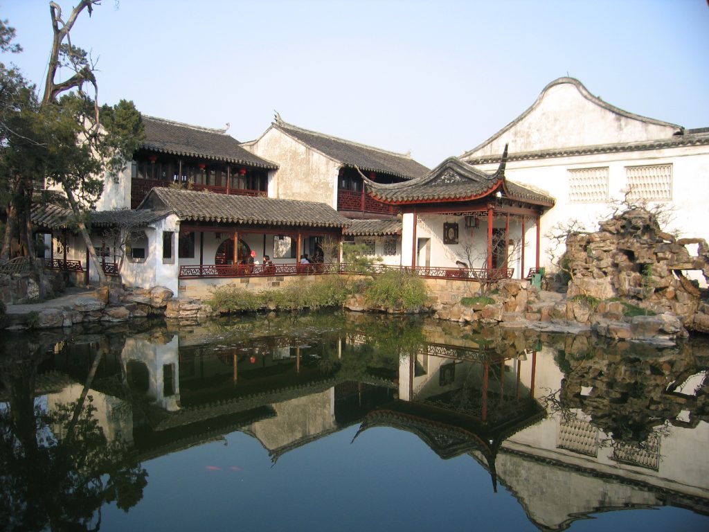 Pond, rockery, and pavilion inside Suzhou’s Master of Nets Garden
