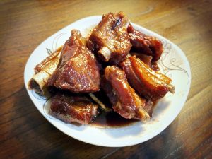 Plate of Wuxi sweet soy-braised spare ribs from a classic local shop
