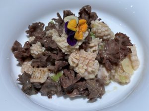 Quick-fried tripe and gizzard dish served with dipping sauces