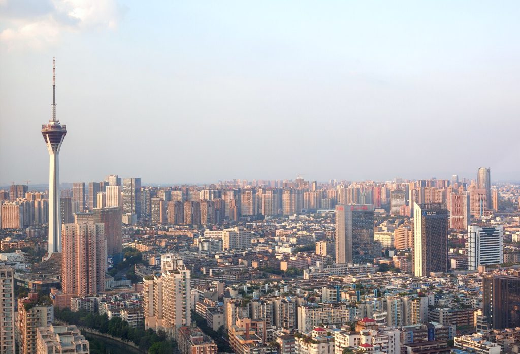 Chengdu city view with traditional and modern buildings under autumn light