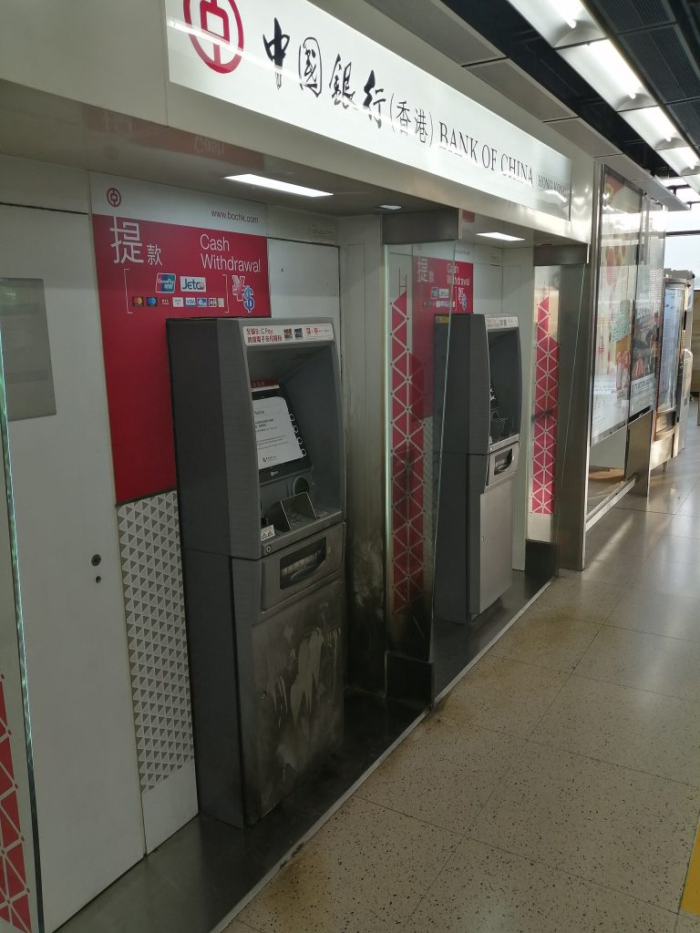 Bank ATM keypad and card slot in a Chinese city lobby