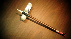 Traditional Chinese calligraphy brushes with bamboo handles ready for writing
