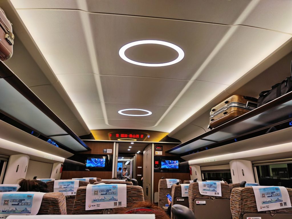 Interior of a China high-speed train carriage with rows of modern seats