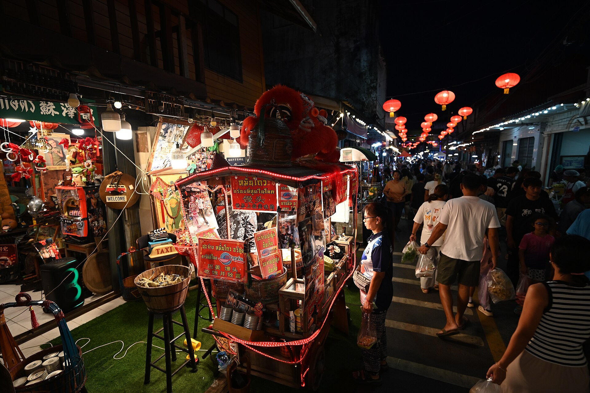 Colorful souvenirs and crafts displayed at an outdoor market stall