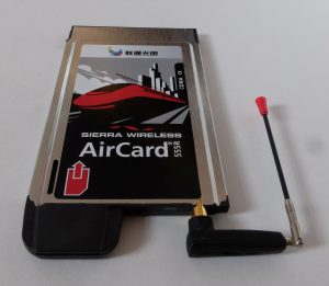 Assorted China mobile SIM packaging next to a smartphone