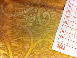 Friends splitting a restaurant bill with QR codes on phones
