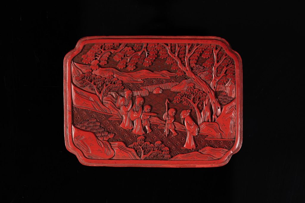 Carved red lacquer Chinese gift box with traditional decorative motifs