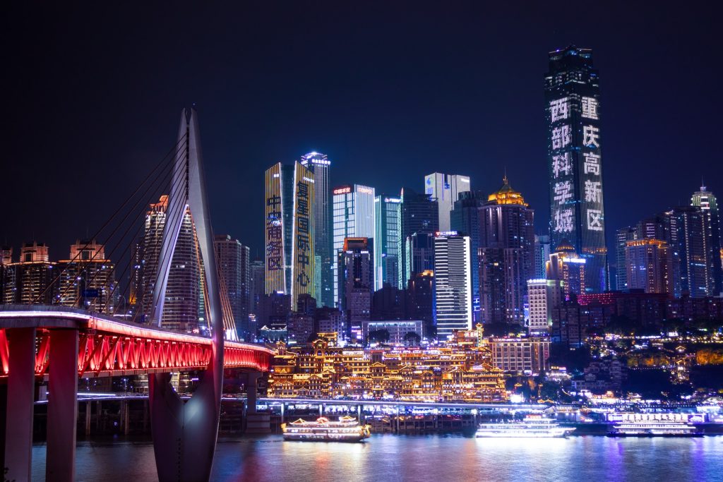 Chongqing hillside skyline with monorail and river confluence
