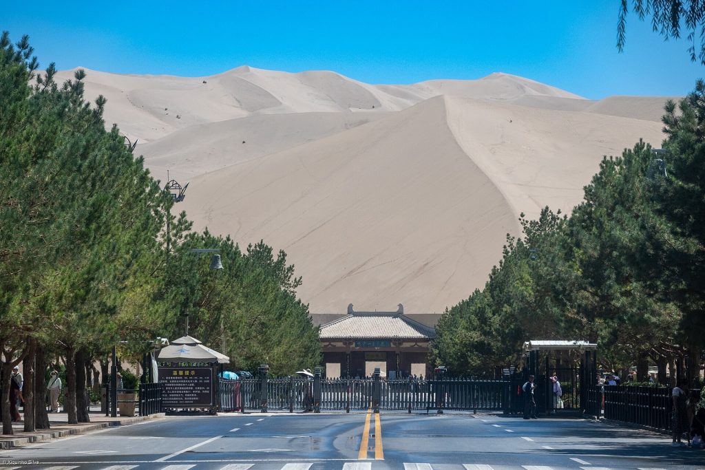 Mingsha sand dunes near Dunhuang under a clear late-autumn sky