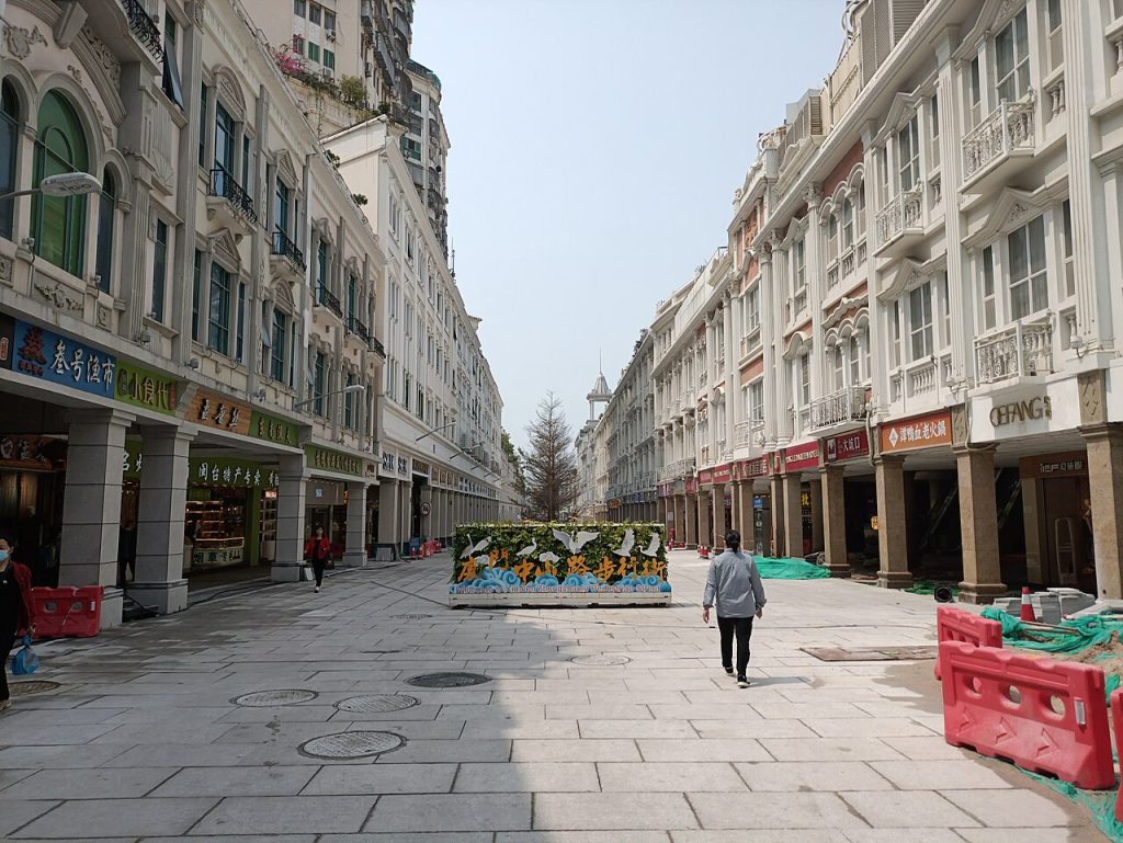 Pedestrians on Xiamen Zhongshan Road shopping street under daytime sky