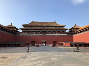Forbidden City Meridian Gate plaza with visitors holding tickets under clear sky