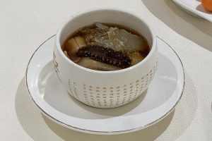 Traditional jar of Fujian fotiaoqiang Buddha Jumps Over the Wall soup with rich broth and seafood ingredients