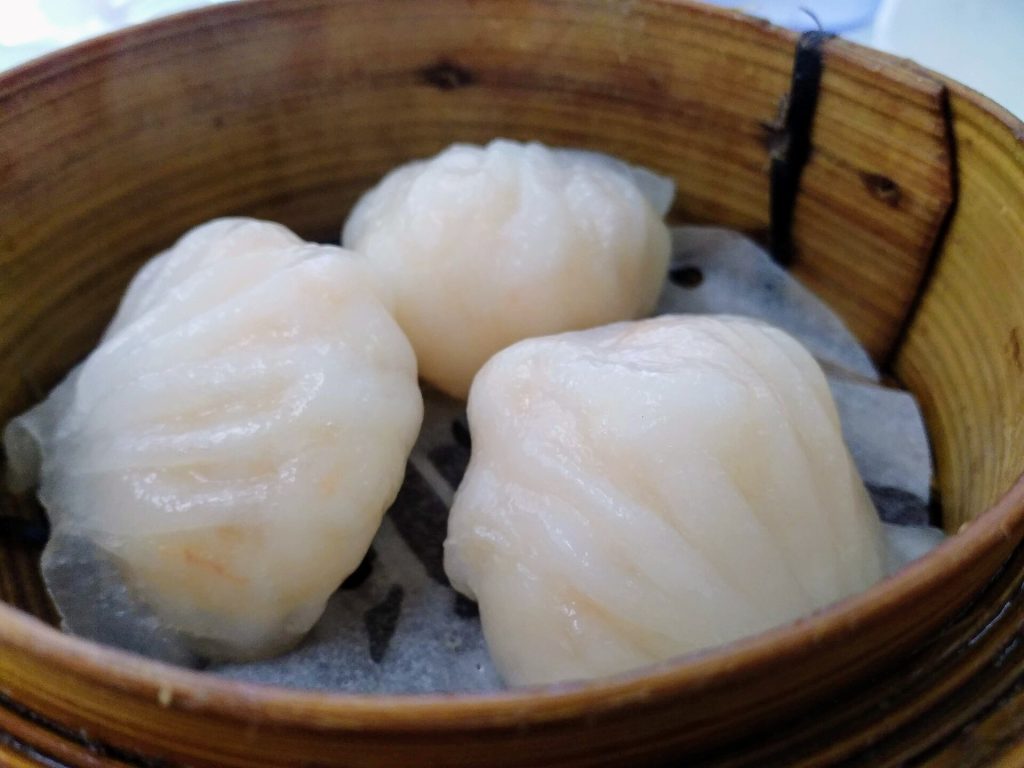 Assorted Cantonese dim sum in bamboo steamer baskets