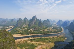 Li River karst peaks near Guilin reflected in calm water