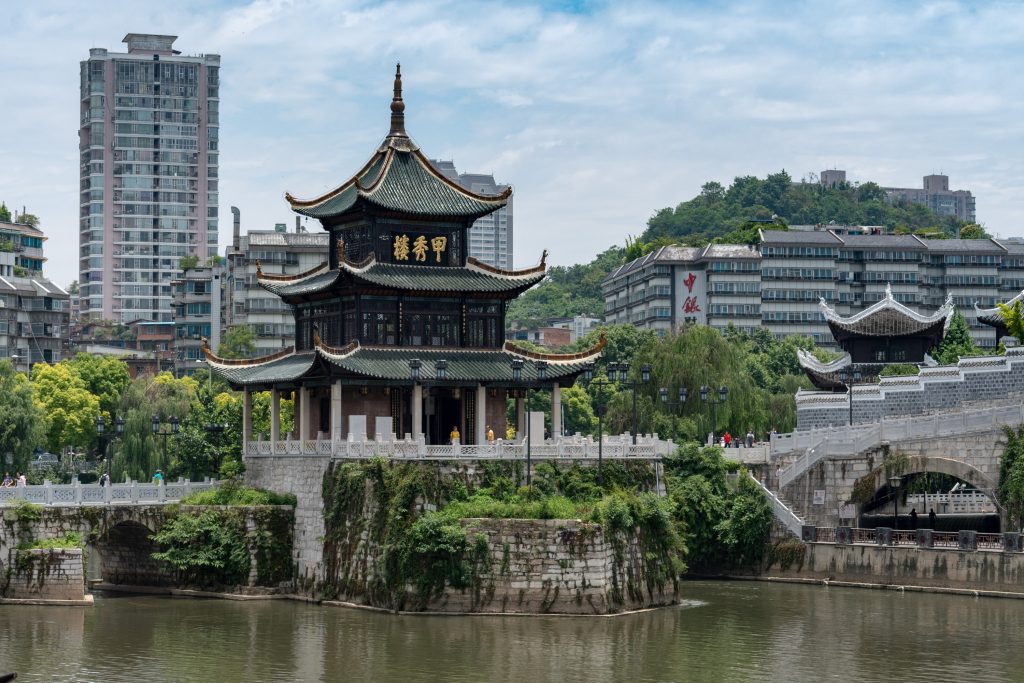 Jiaxiu Pavilion rising over the Nanming River in Guiyang