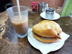 Macau pork chop bun sandwich on a paper wrapper