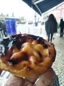 Golden Portuguese-style egg tarts with caramelized custard tops