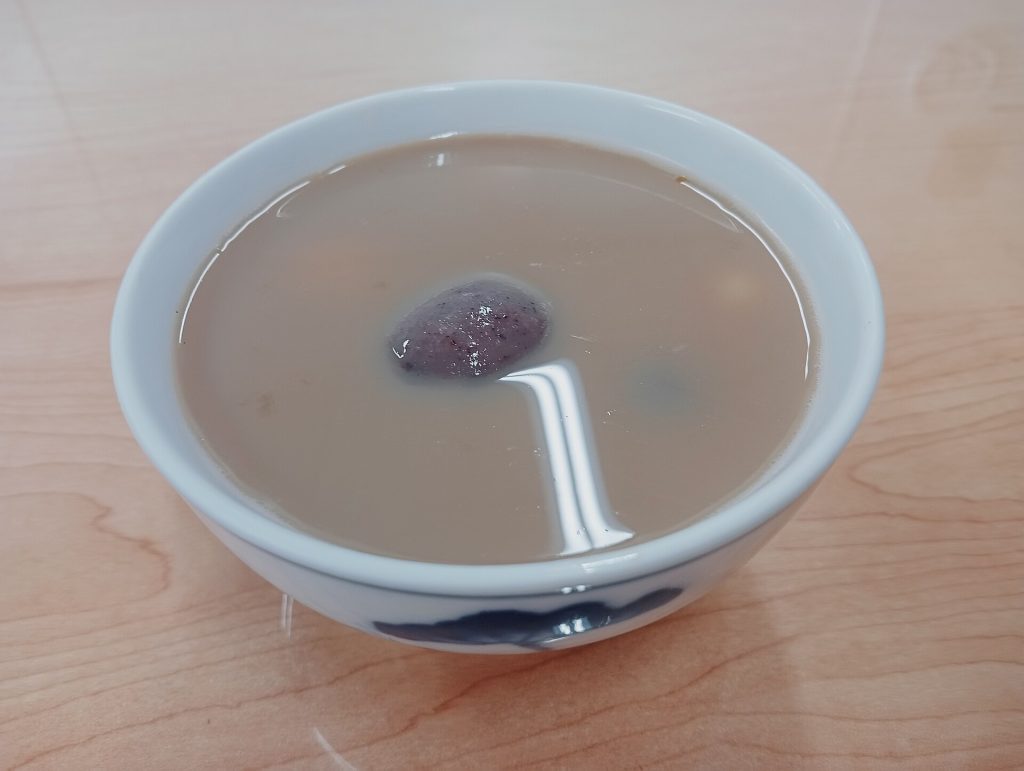 Bowl of Chinese glutinous rice balls tangyuan in sweet soup