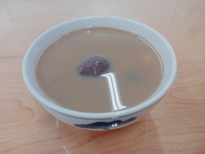 Bowl of Chinese glutinous rice balls tangyuan in sweet soup
