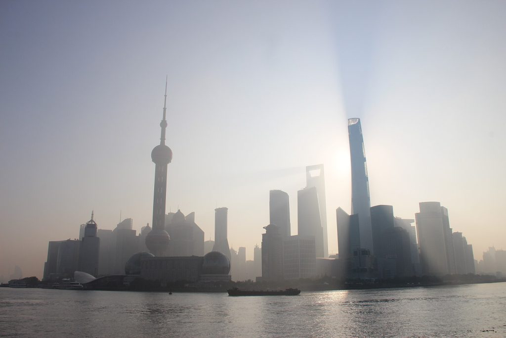 Shanghai Bund skyline across the Huangpu River in soft morning light