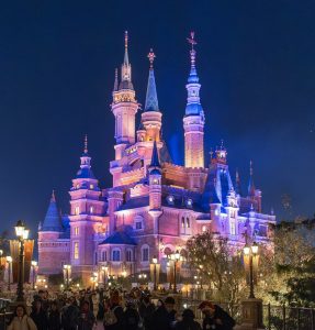 Shanghai Disneyland castle and crowds on a clear day