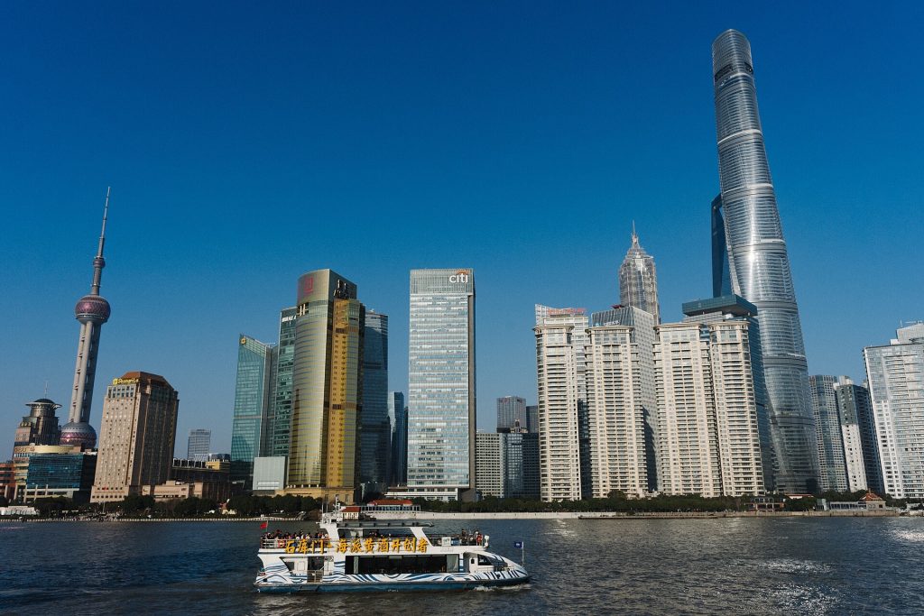 Shanghai Bund skyline across the Huangpu River on a clear autumn afternoon