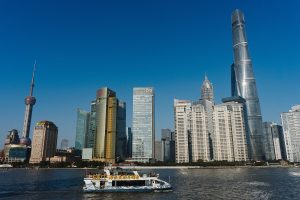 Shanghai Bund skyline across the Huangpu River on a clear autumn afternoon