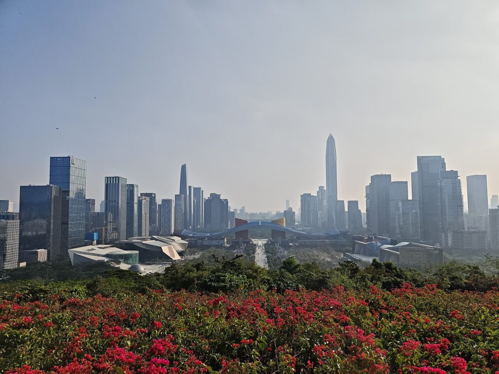Shenzhen modern skyline and civic plaza under clear daylight