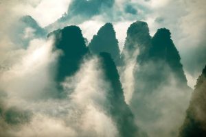 Karst limestone peaks rising above the countryside near Yangshuo in Guangxi
