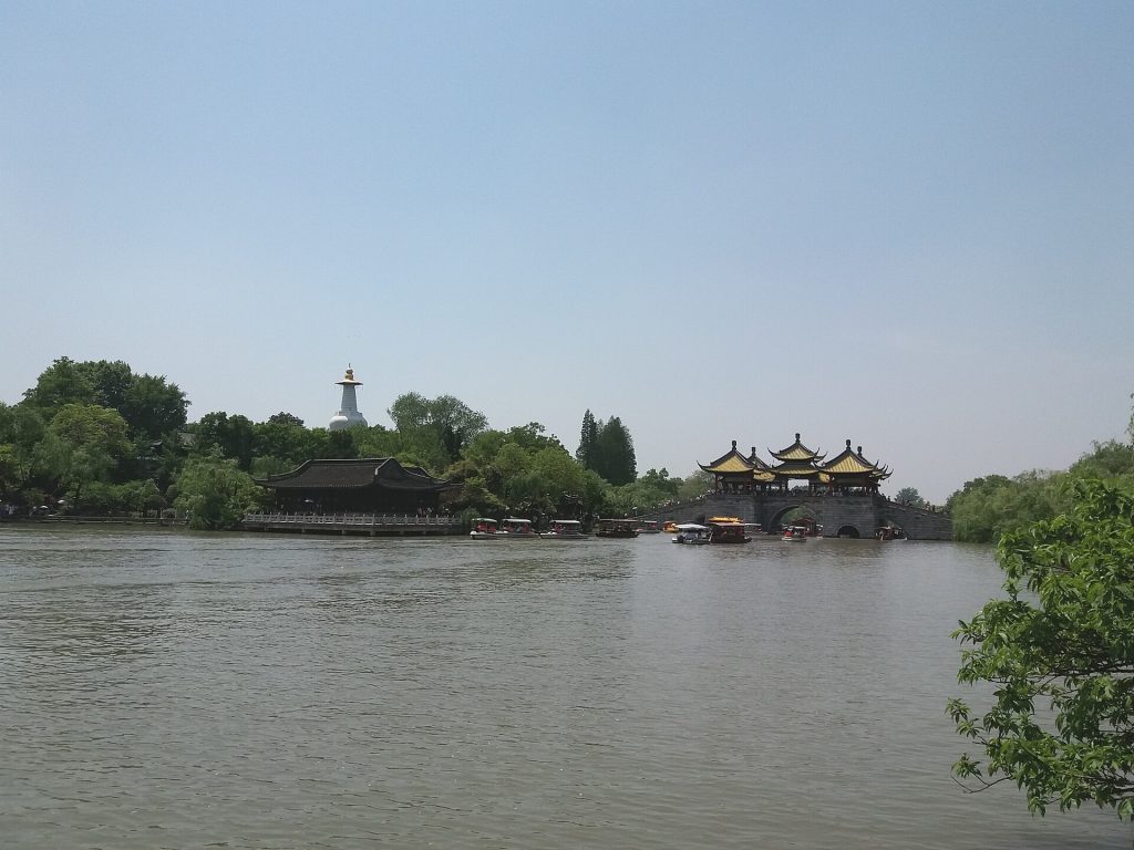 Five Pavilion Bridge reflected on Slender West Lake in Yangzhou